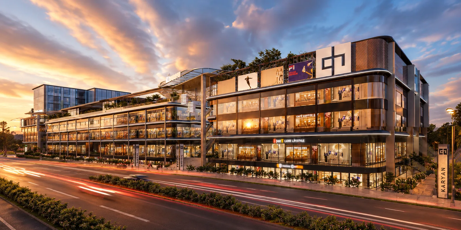 Karyan Group commercial building with retail frontage and the Karyan emblem at sunset