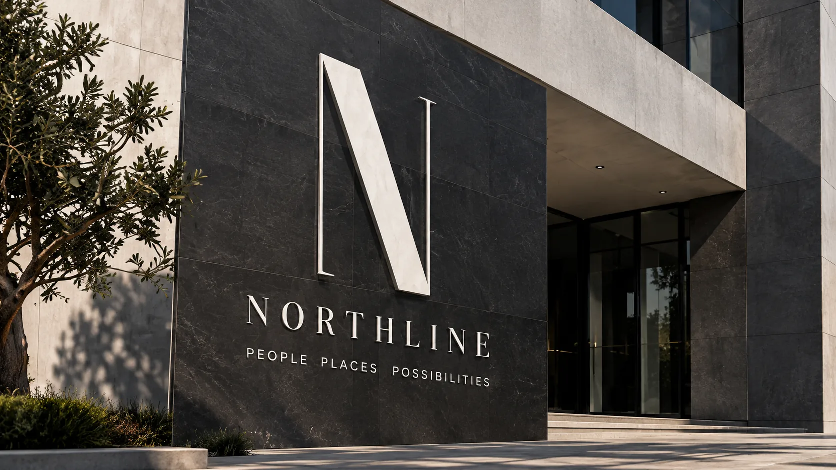 Northline real estate brand signage with N monogram on a dark stone building facade
