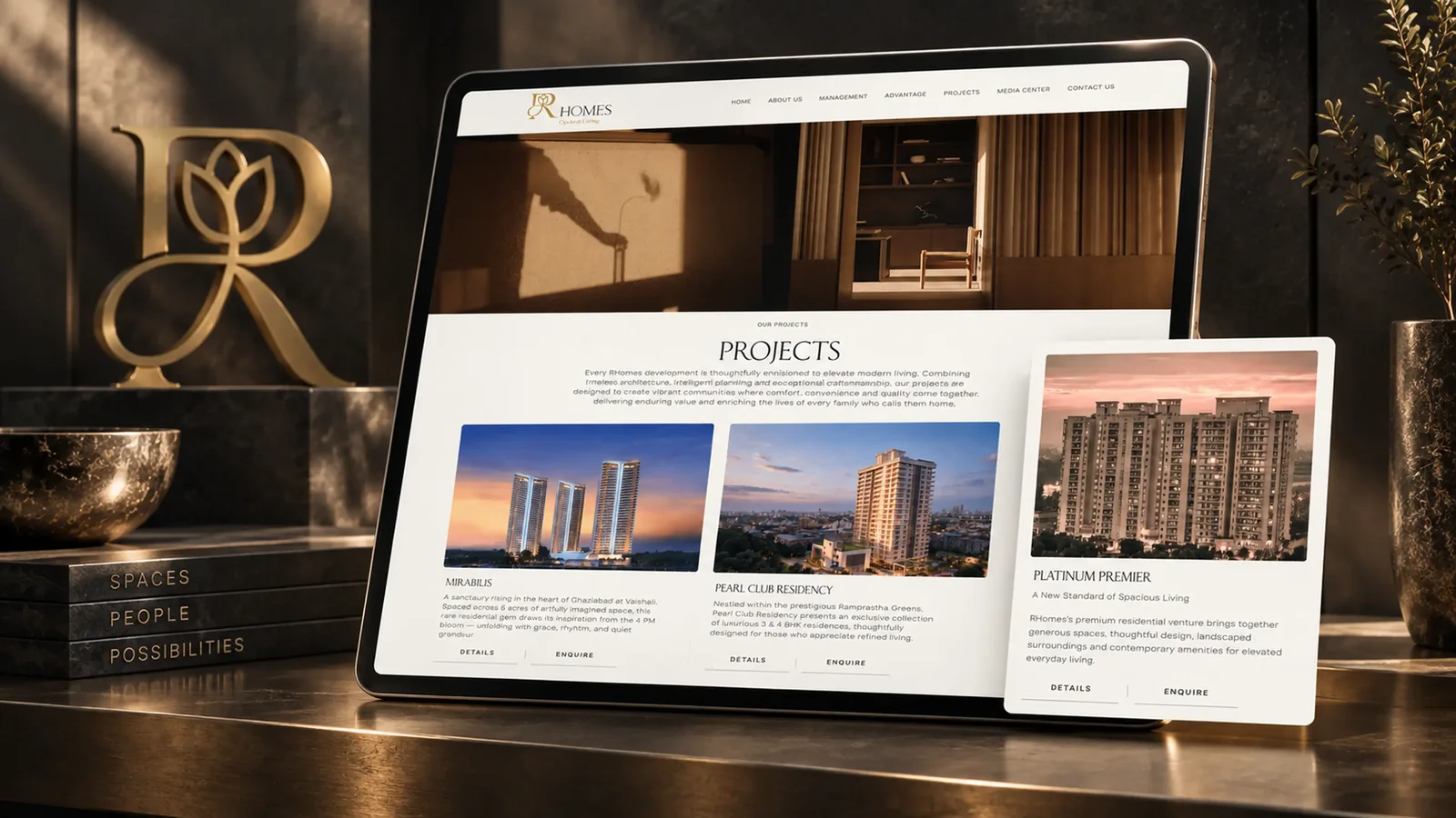 RHomes website projects page showing Mirabilis, Pearl Club Residency and Platinum Premier on tablet